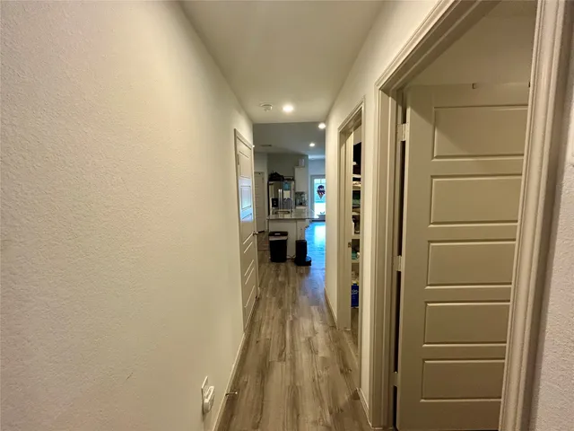 a view of a livingroom with furniture and staircase