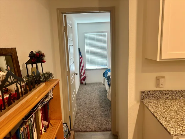 a view of a kitchen from a house