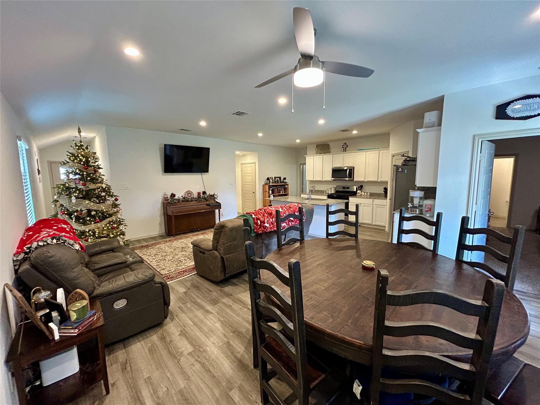 6515 Alexis Street Beaumont, TX 77708 - Photo 31 of 36 a view of a dining room with furniture and a chandelier
