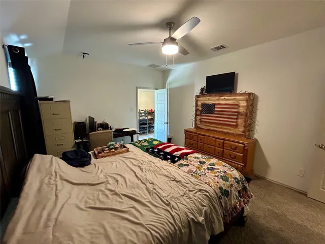 a bathroom with sink and mirror