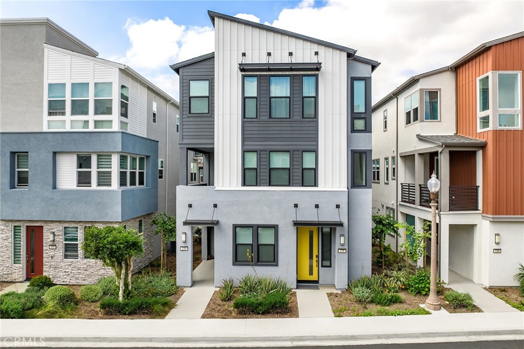 a front view of a building with garden