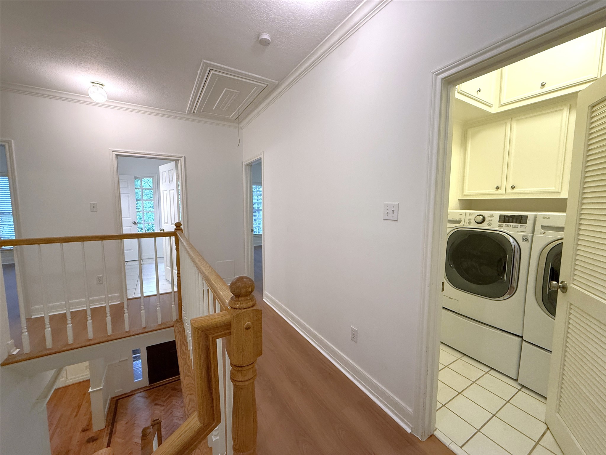 3024 Rice Boulevard Houston, TX 77005 - Photo 22 of 38 Conveniently located just past the door into the primary bedroom is the laundry room. Washer/Dryer included!