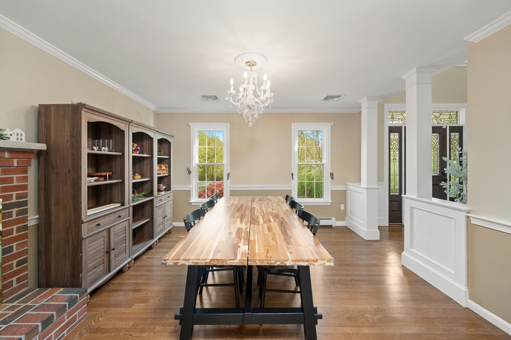 203 Richie Road Attleboro, MA 02703 - Photo 15 of 42 wooden floor in an empty room with a window