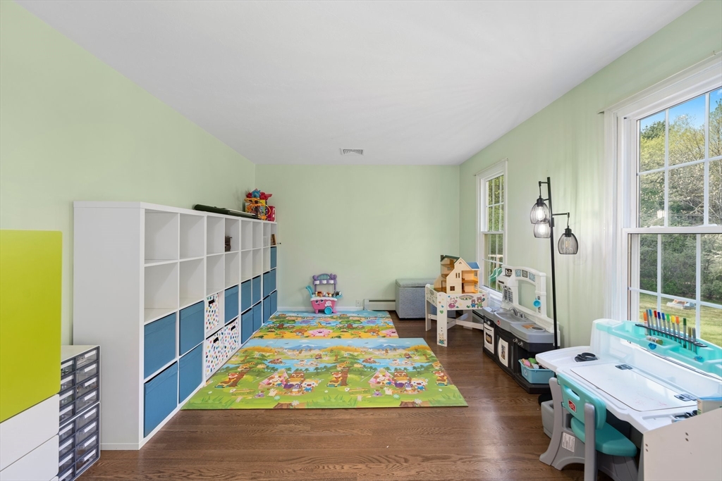 203 Richie Road Attleboro, MA 02703 - Photo 22 of 42 a room with furniture and a table