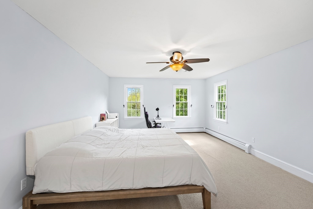 203 Richie Road Attleboro, MA 02703 - Photo 24 of 42 a bedroom with a bed and window