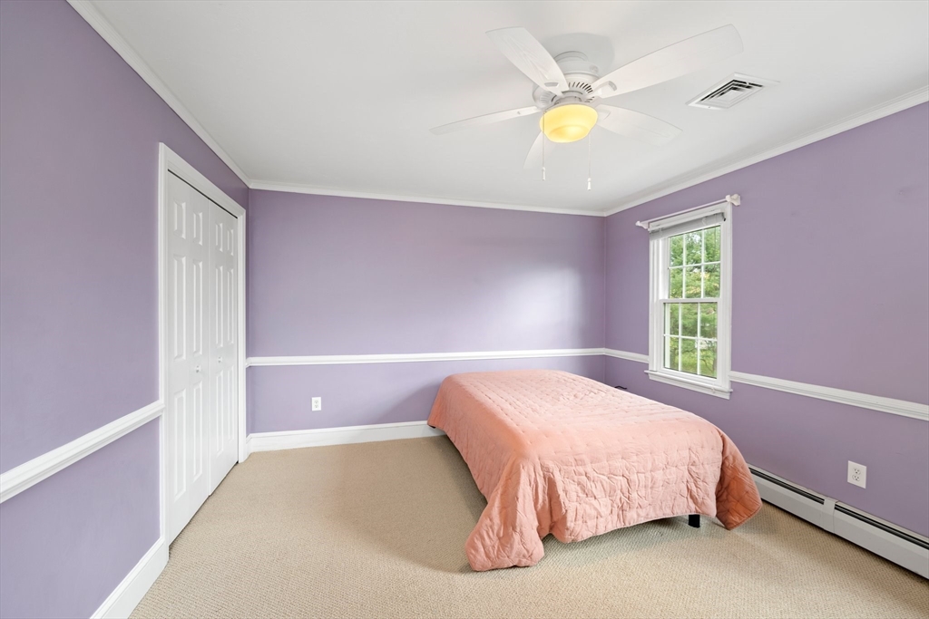 203 Richie Road Attleboro, MA 02703 - Photo 28 of 42 a bedroom with a bed and a window
