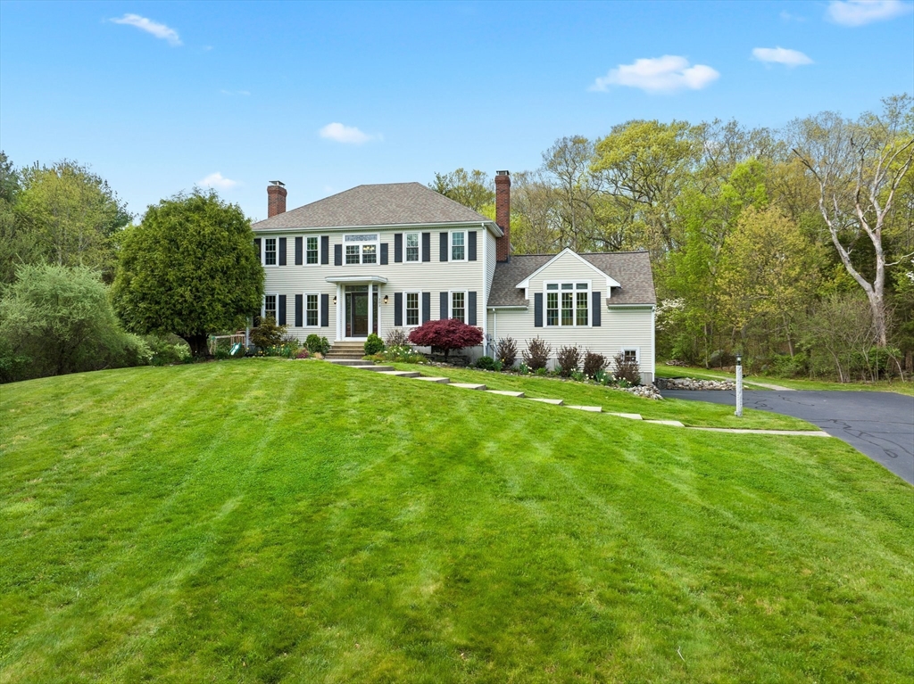 203 Richie Road Attleboro, MA 02703 - Photo 3 of 42 a view of a house with a big yard and large trees