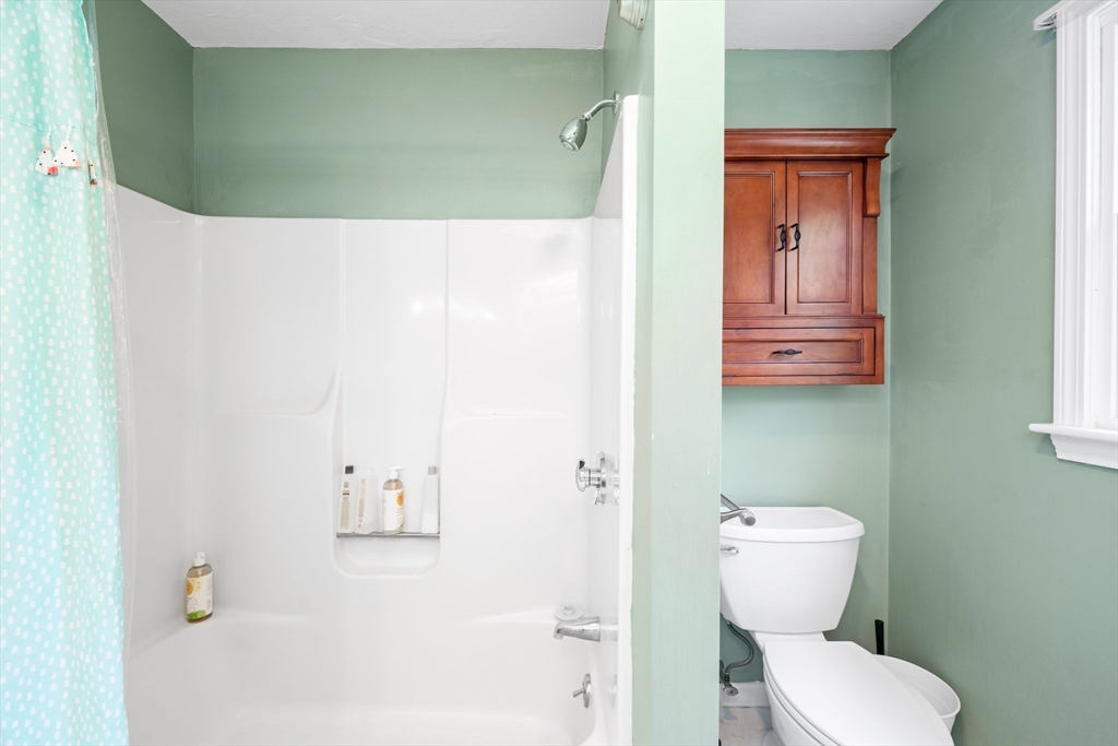 203 Richie Road Attleboro, MA 02703 - Photo 31 of 42 a bathroom with a toilet and a sink