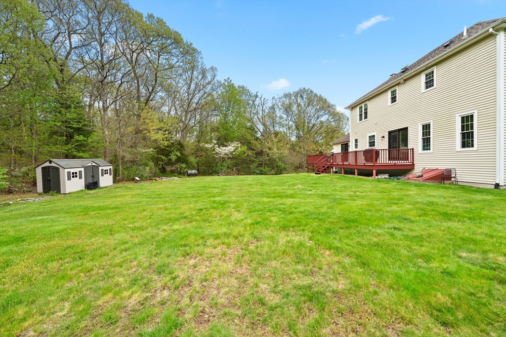 203 Richie Road Attleboro, MA 02703 - Photo 40 of 42 a view of a house with a big yard