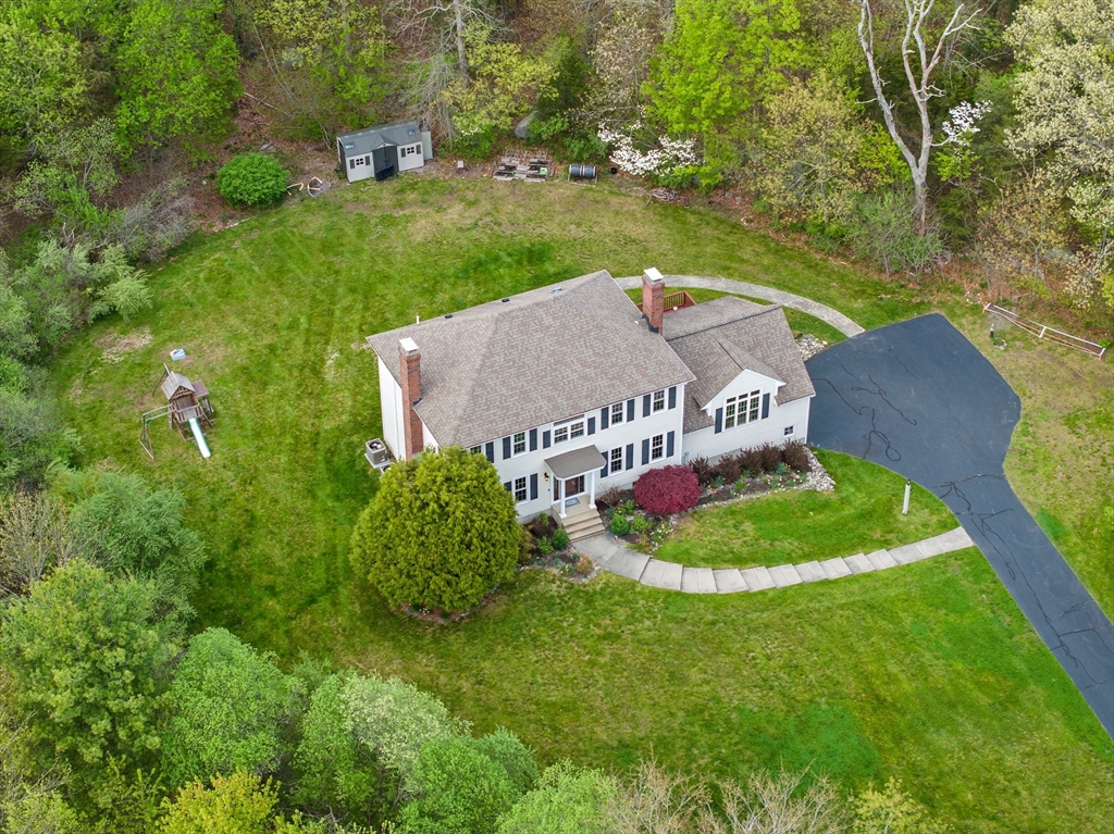 203 Richie Road Attleboro, MA 02703 - Photo 41 of 42 a view of a table and chairs in the garden