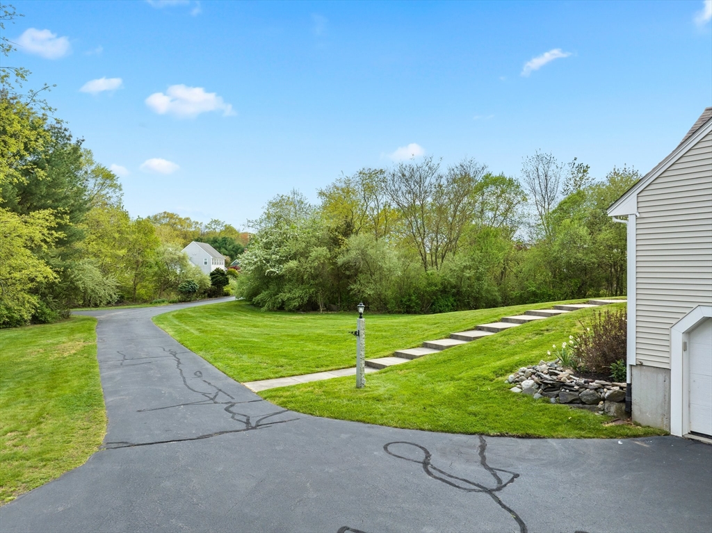 203 Richie Road Attleboro, MA 02703 - Photo 6 of 42 a view of a park with large trees
