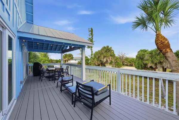 a view of an empty room with stairs