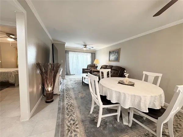 a view of a dining room with furniture