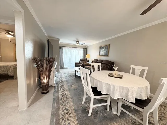 a view of a dining room with furniture