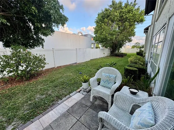 a view of a couches in the backyard