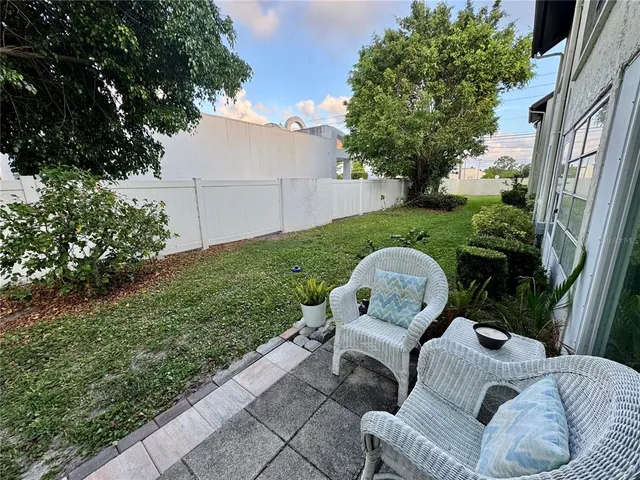 a view of a couches in the backyard