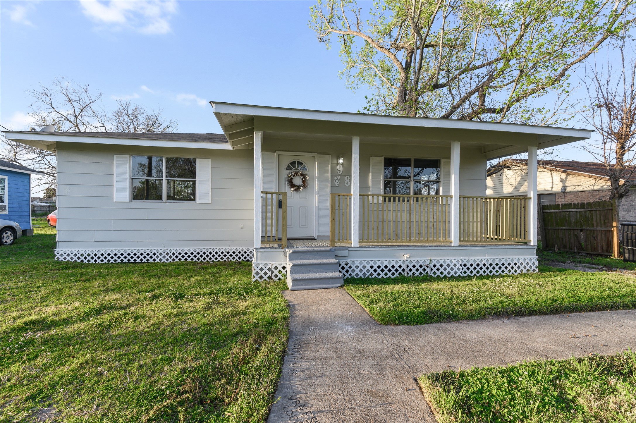 986 Dewalt Street Houston, TX 77088 - Photo 1 of 18 a front view of a house with a garden
