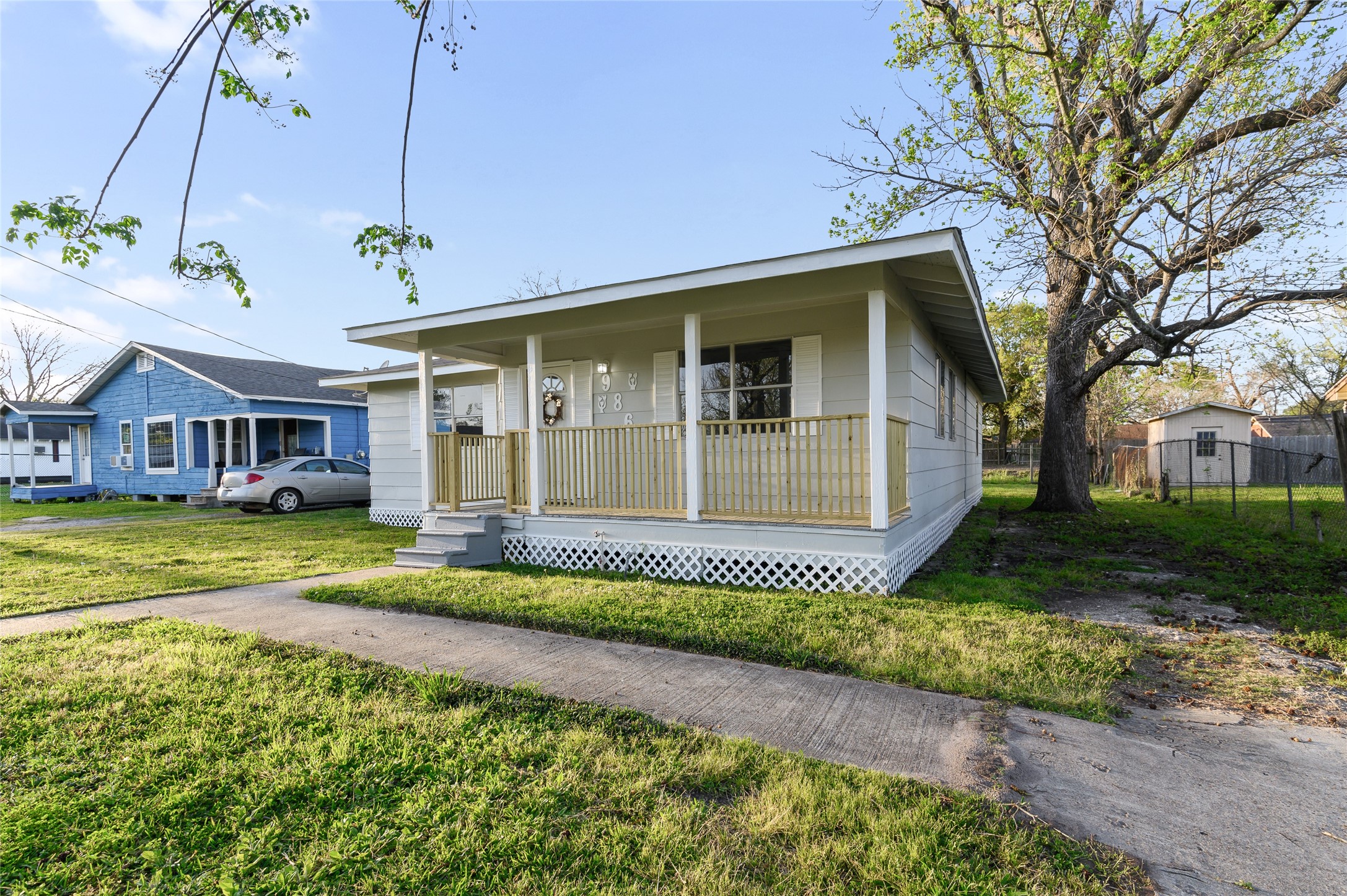 986 Dewalt Street Houston, TX 77088 - Photo 2 of 18 a front view of a house with a yard