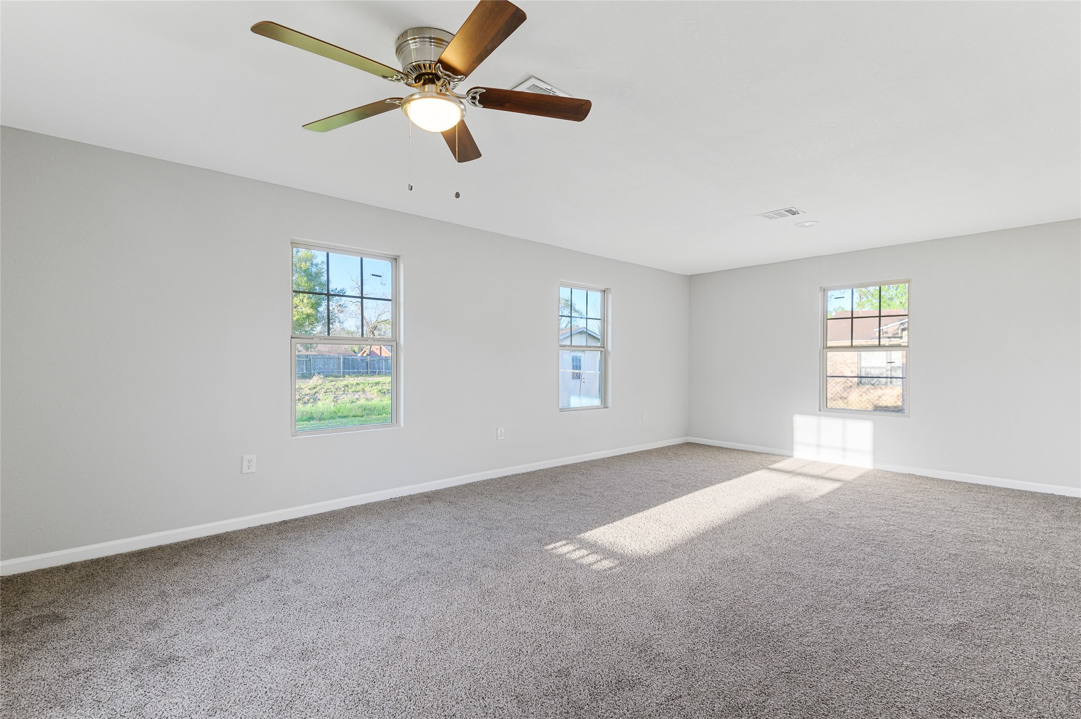 986 Dewalt Street Houston, TX 77088 - Photo 3 of 18 a view of an empty room with a window