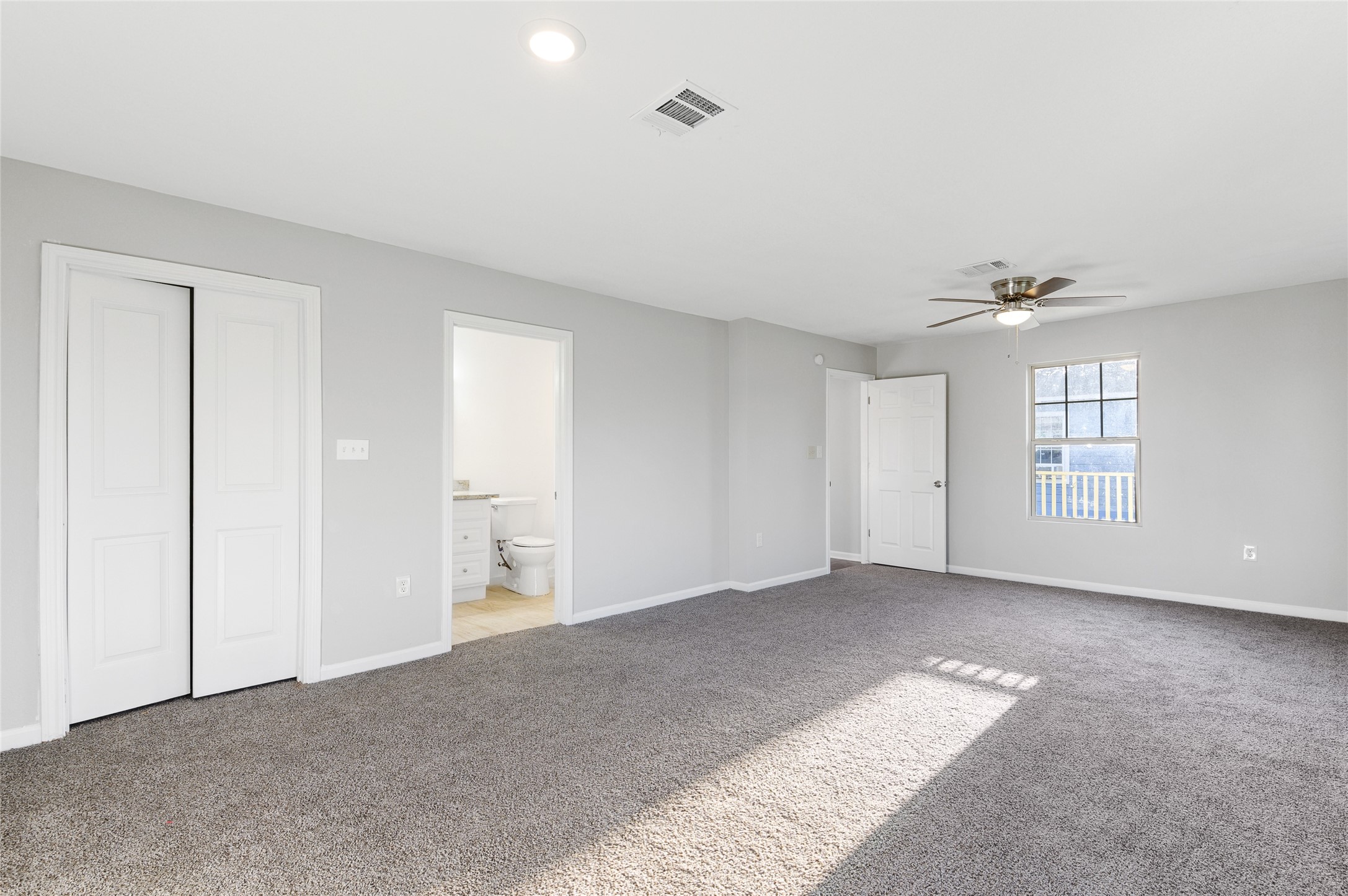 986 Dewalt Street Houston, TX 77088 - Photo 5 of 18 a view of an empty room with a window