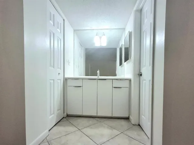 a bathroom with a shower and a toilet