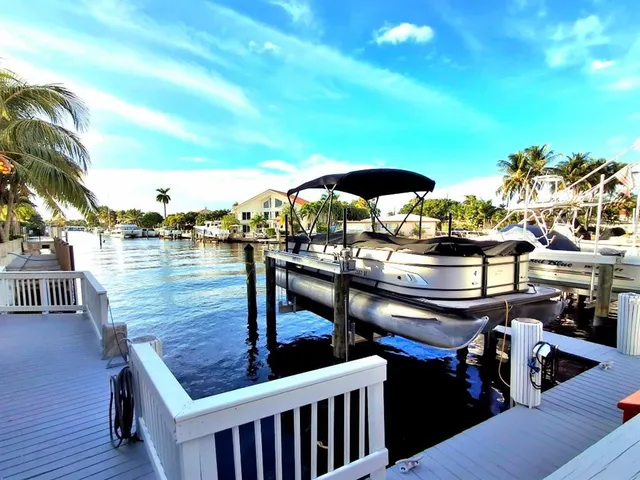 a balcony with trees in front of it