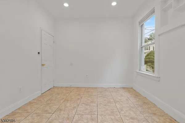 a bathroom with a toilet a sink and bathtub