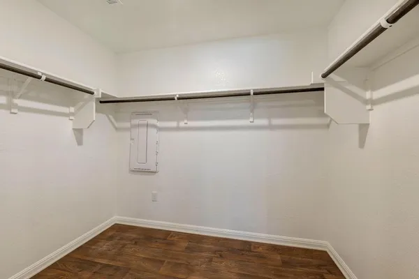 a view of a room with racks on the wall