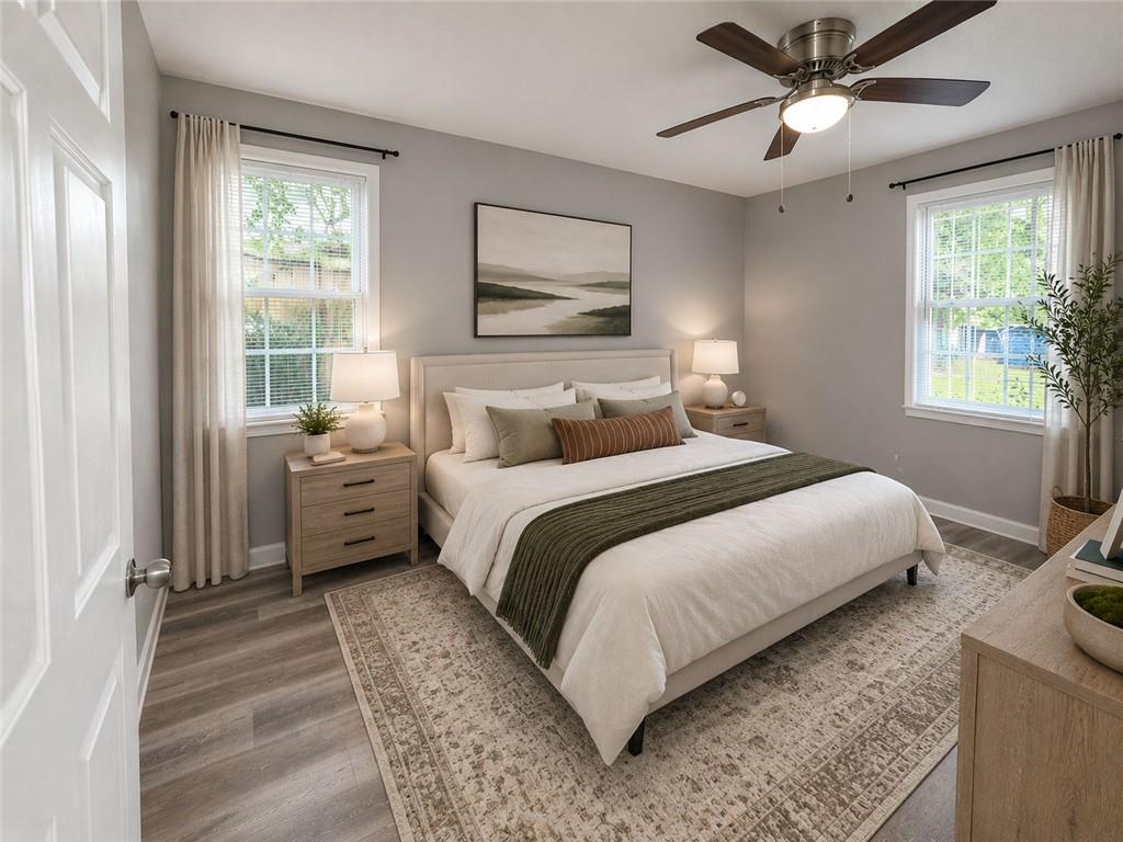 1280 Elizabeth Avenue Southwest Atlanta, GA 30310 - Photo 5 of 11 a bedroom with a bed and a window
