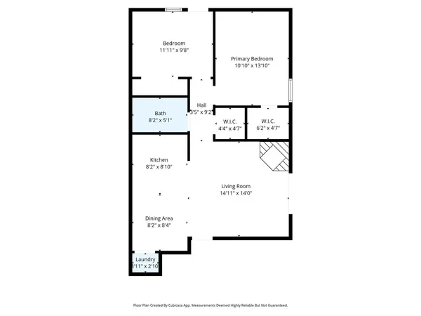 a picture of a bench in front of a wall