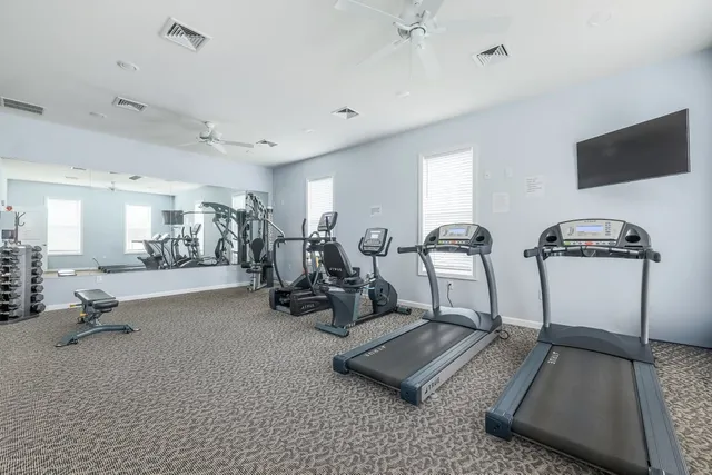 a view of a room with gym equipment