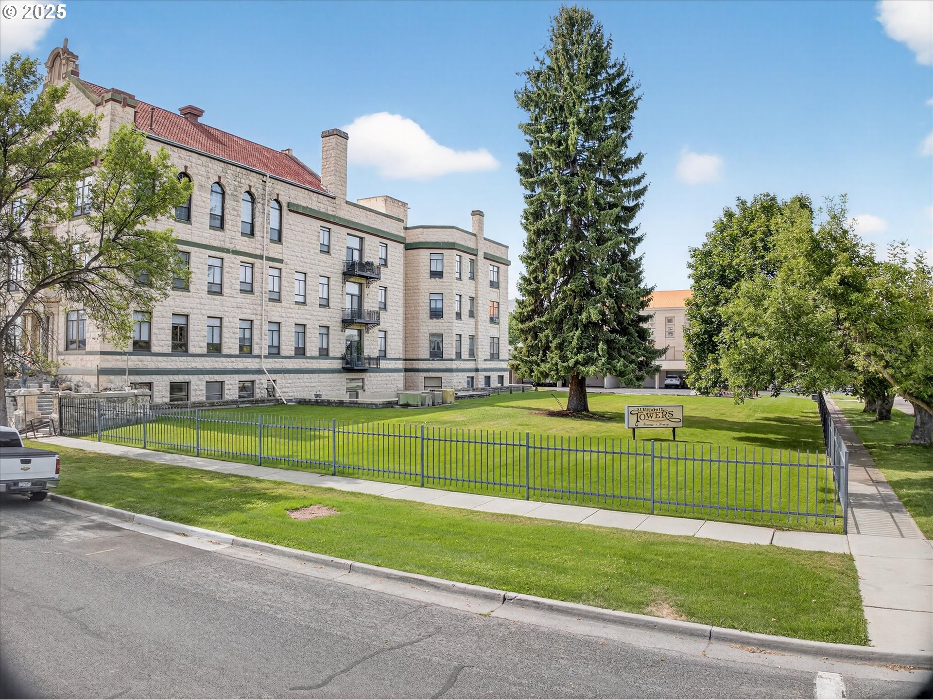 2365 4th Street, Unit 201 Baker City, OR 97814 - Photo 20 of 33 a view of swimming pool is middle in the garden