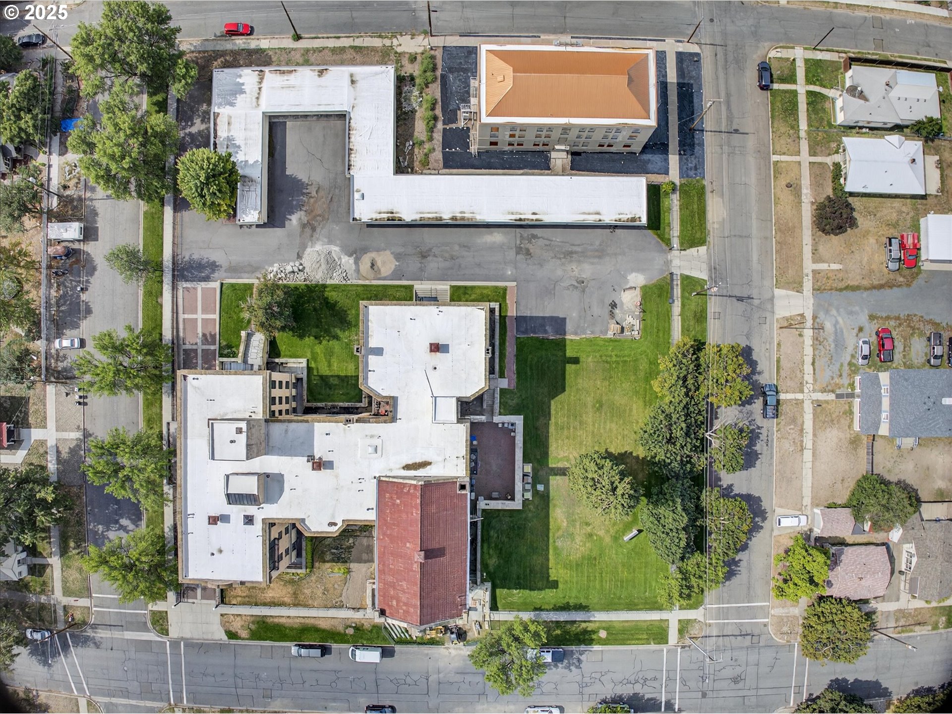 2365 4th Street, Unit 201 Baker City, OR 97814 - Photo 25 of 33 an aerial view of multiple houses with outdoor space