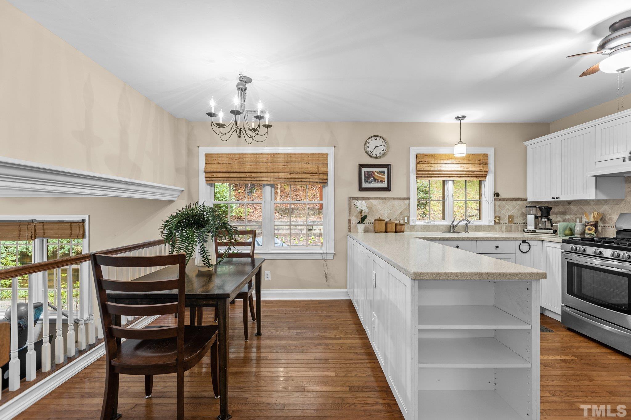108 Rhododendron Court Chapel Hill, NC 27517 - Photo 11 of 38 a kitchen with furniture and window