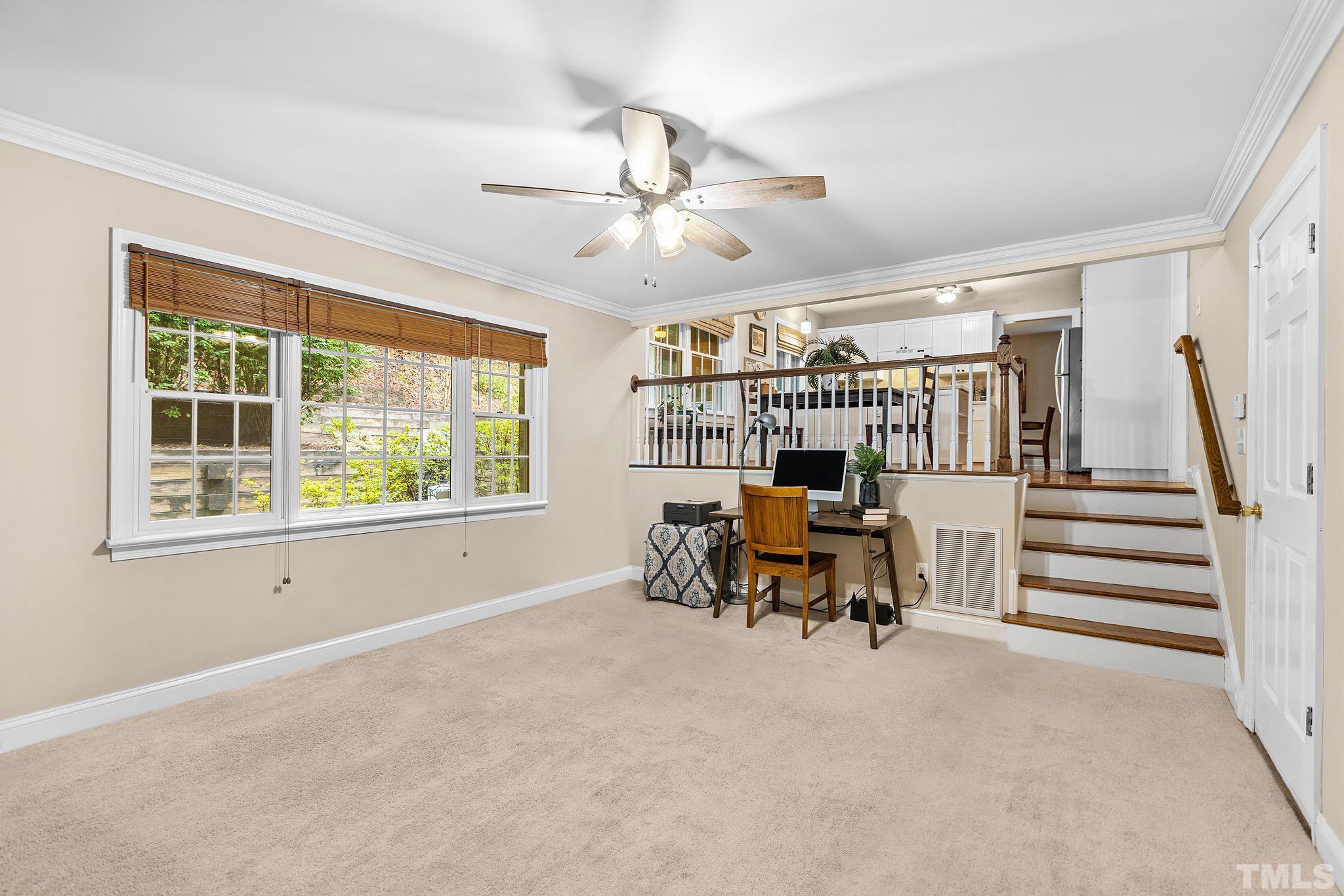 108 Rhododendron Court Chapel Hill, NC 27517 - Photo 15 of 38 a view of a livingroom with furniture and a window