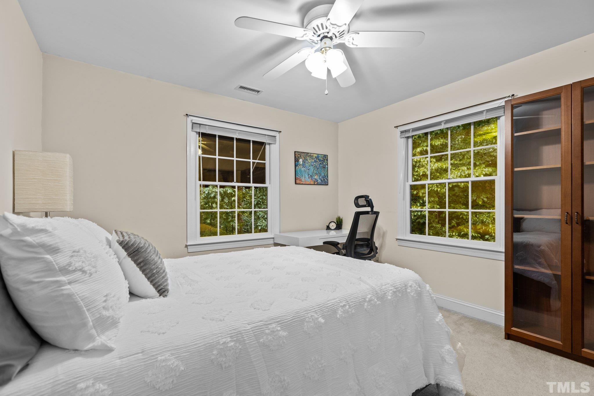 108 Rhododendron Court Chapel Hill, NC 27517 - Photo 21 of 38 a bedroom with a bed and a window