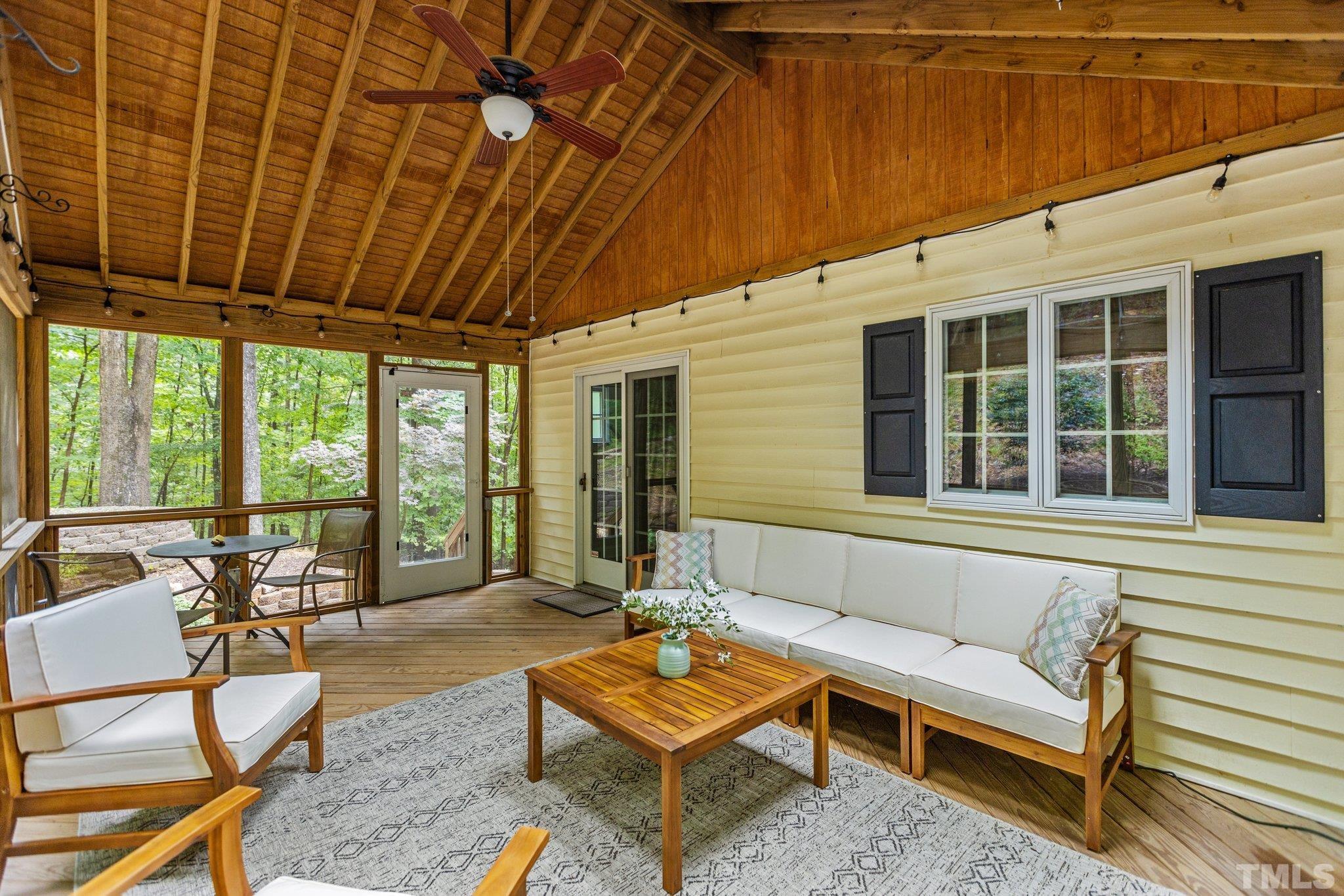 108 Rhododendron Court Chapel Hill, NC 27517 - Photo 28 of 38 a outdoor living space with furniture and a potted plant