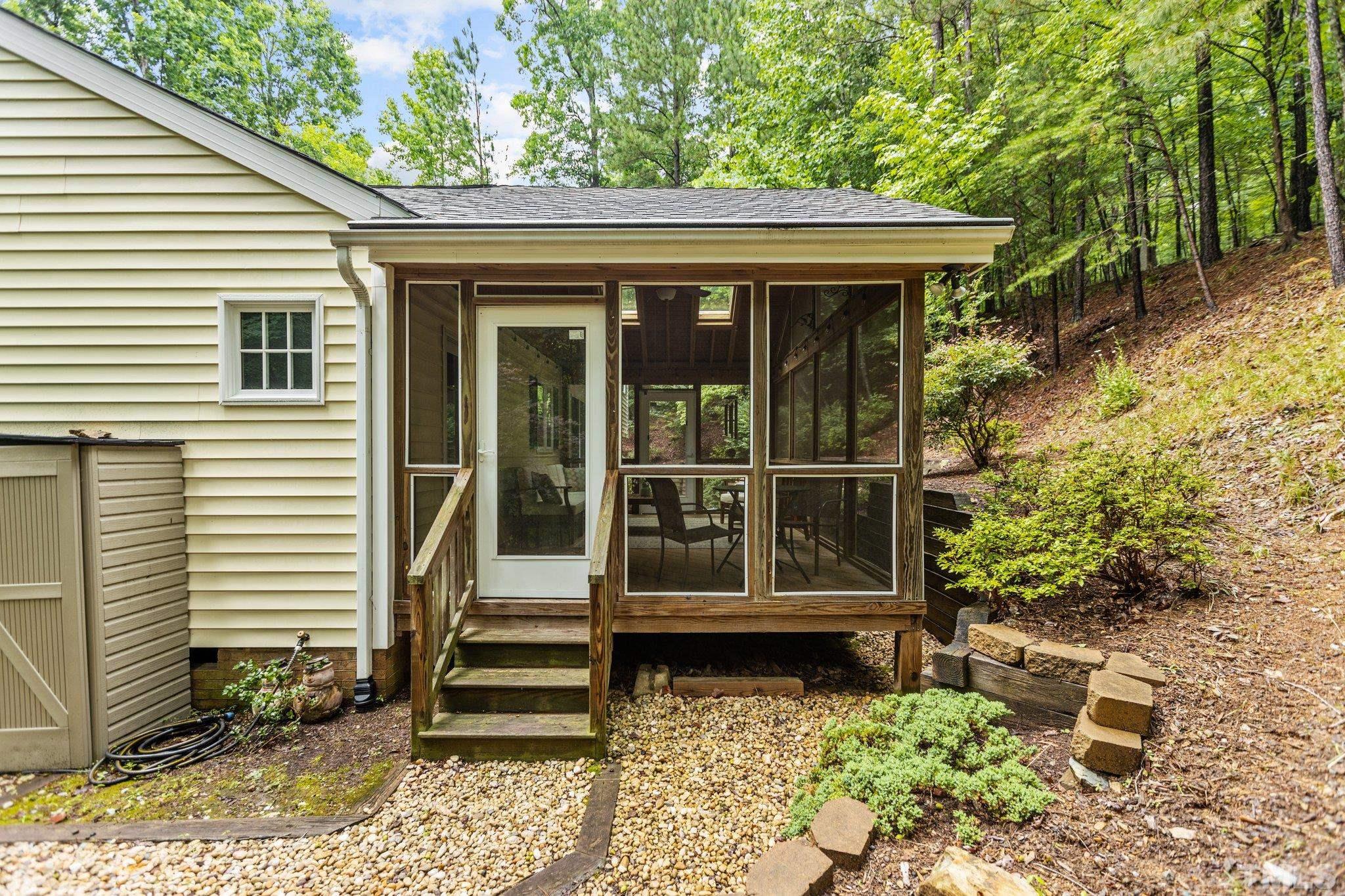 108 Rhododendron Court Chapel Hill, NC 27517 - Photo 29 of 38 a front view of a house with a yard