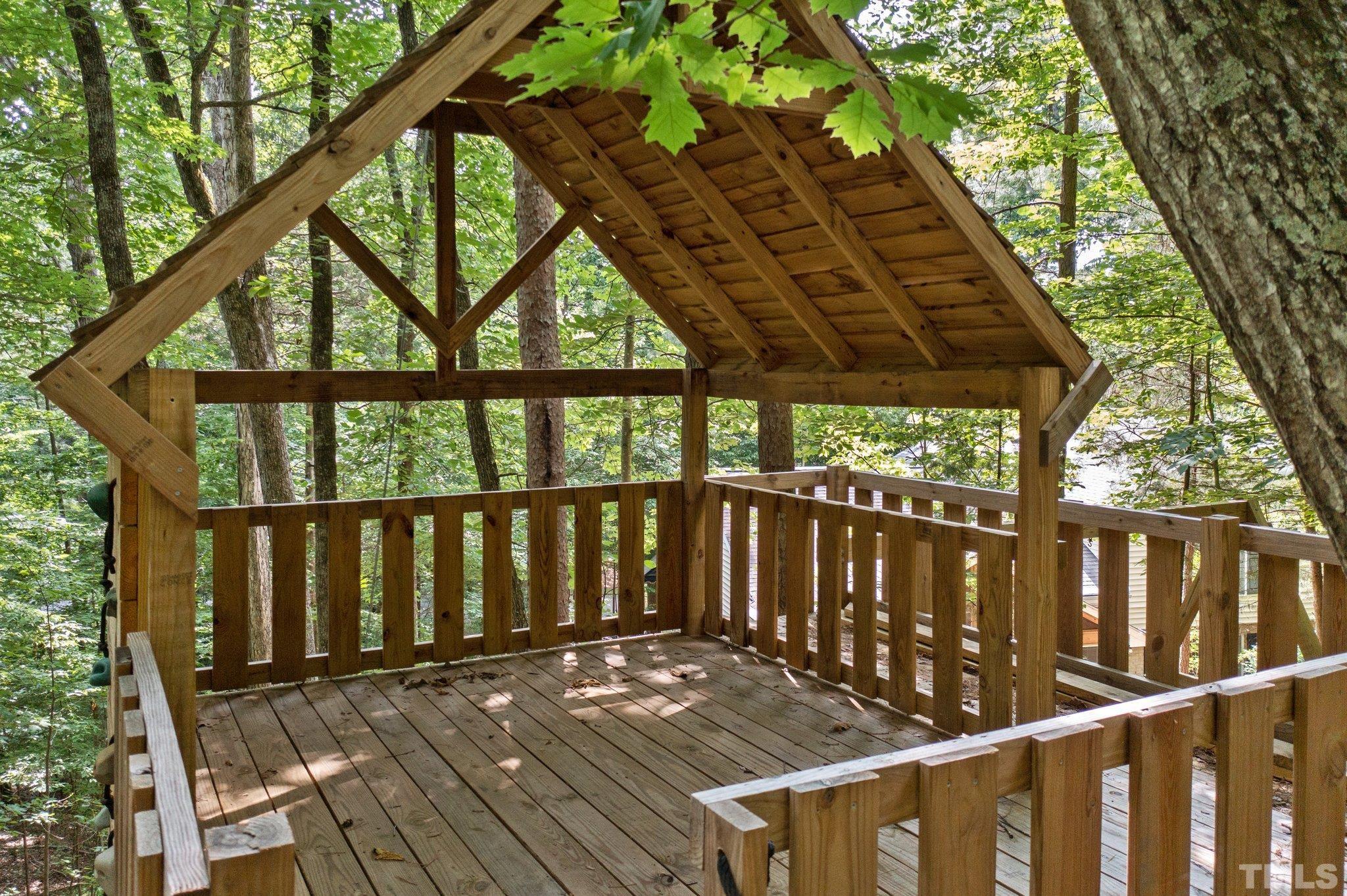 108 Rhododendron Court Chapel Hill, NC 27517 - Photo 37 of 38 a view of a wooden deck