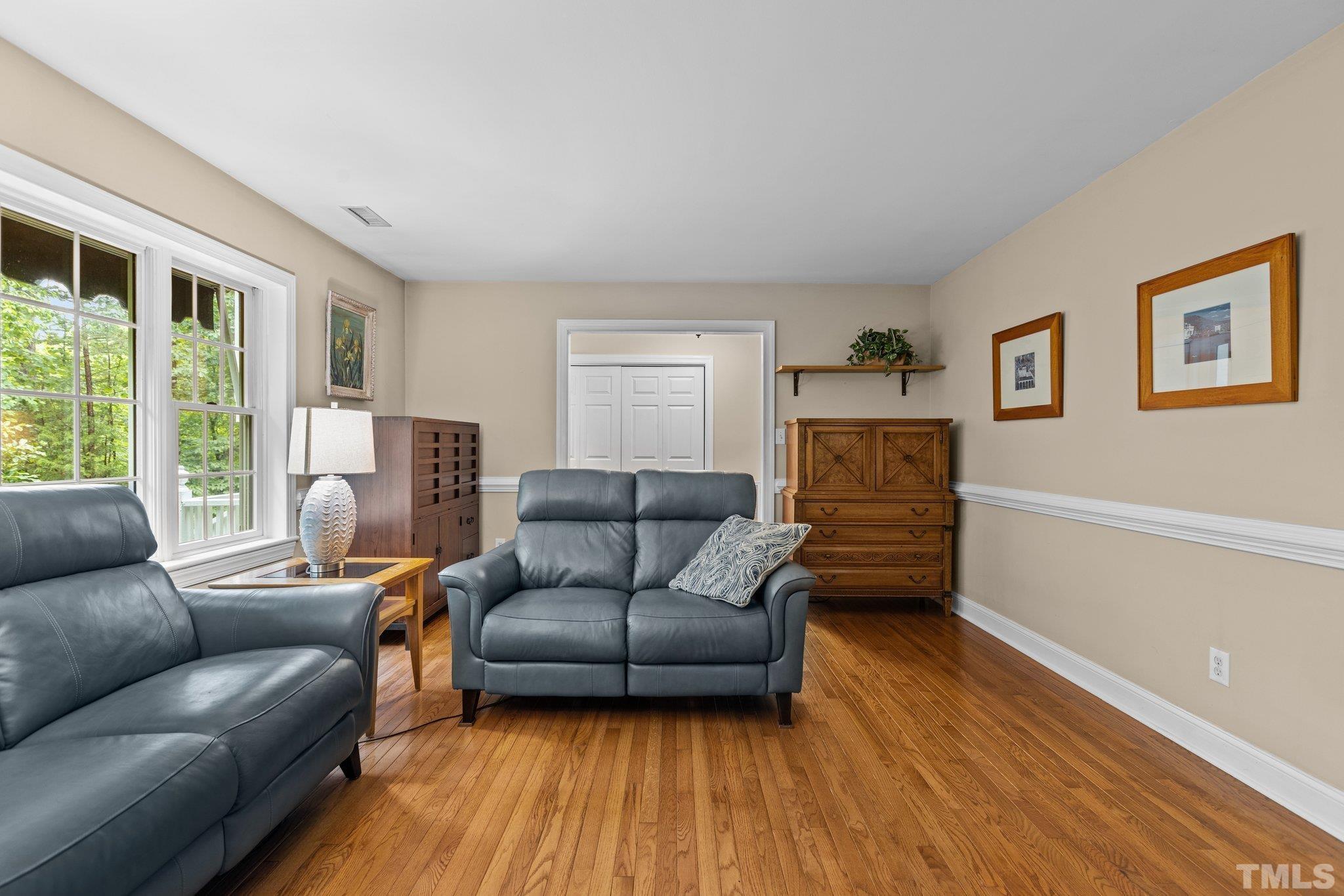 108 Rhododendron Court Chapel Hill, NC 27517 - Photo 4 of 38 a living room with furniture and a fireplace