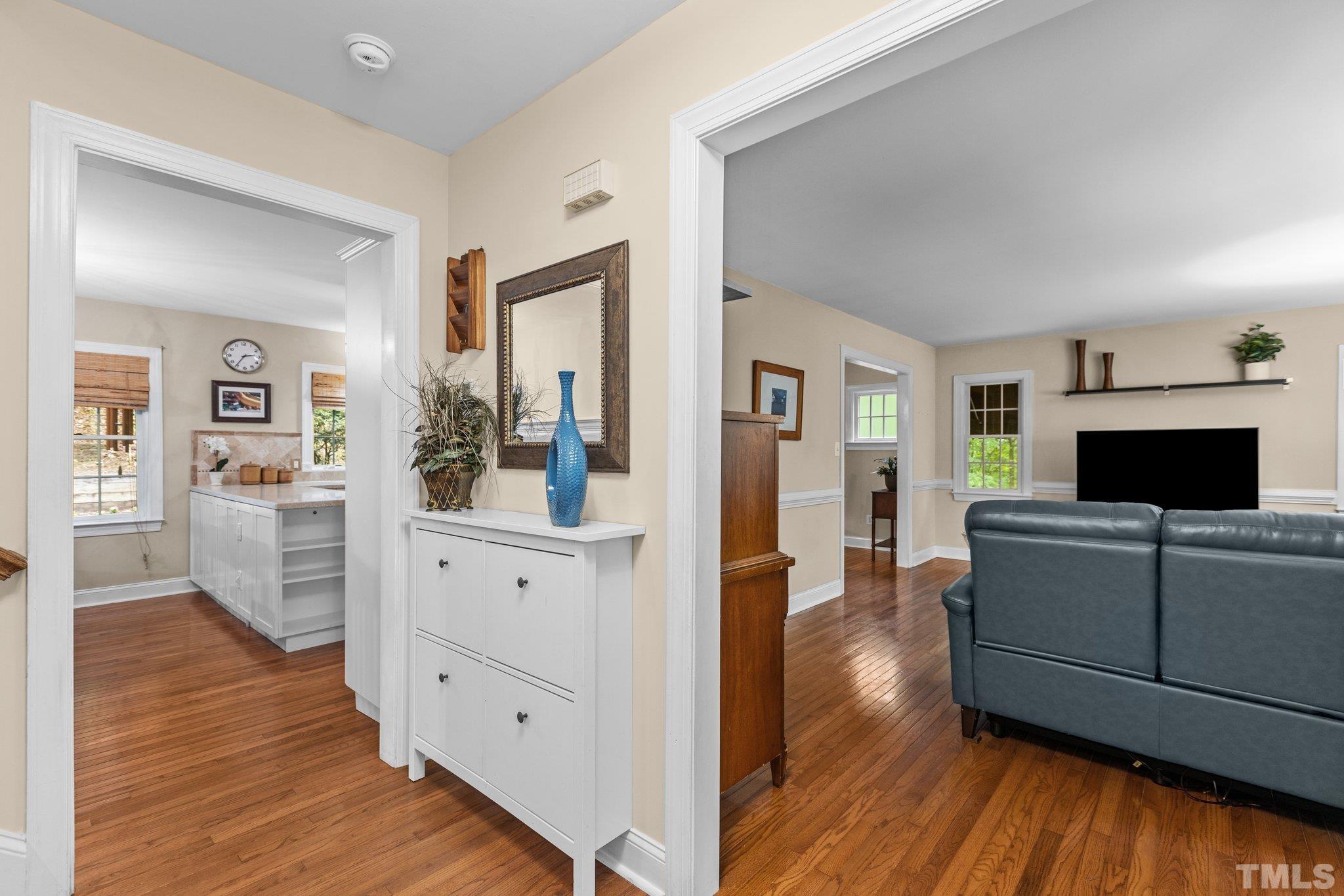 108 Rhododendron Court Chapel Hill, NC 27517 - Photo 5 of 38 a living room with furniture and wooden floor