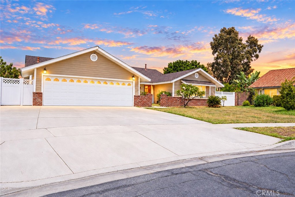 2164 North Date Avenue Rialto, CA 92377 - Photo 2 of 20 Beautiful twilight exterior highlighting the 3 car garage and mountain views