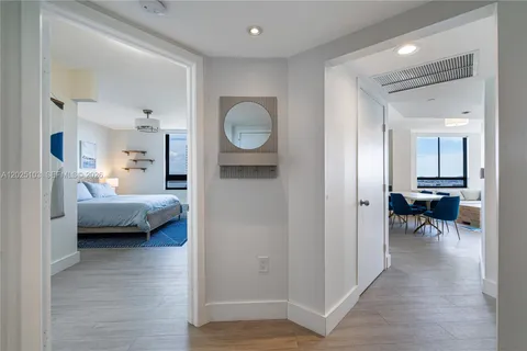 a view of a bedroom from a hallway