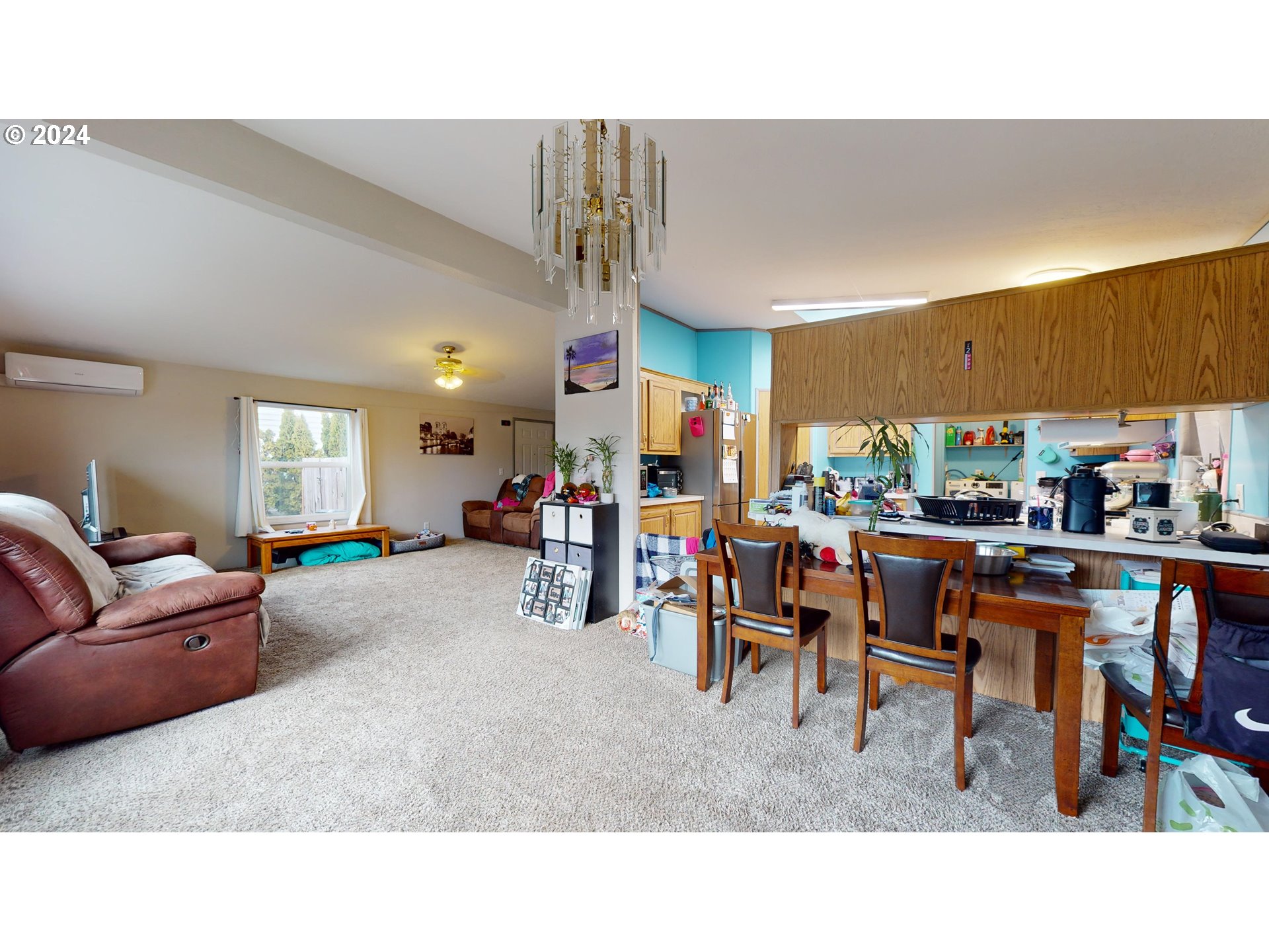 1251 South 58th Street Springfield, OR 97478 - Photo 14 of 24 a living room with lots of furniture and a window