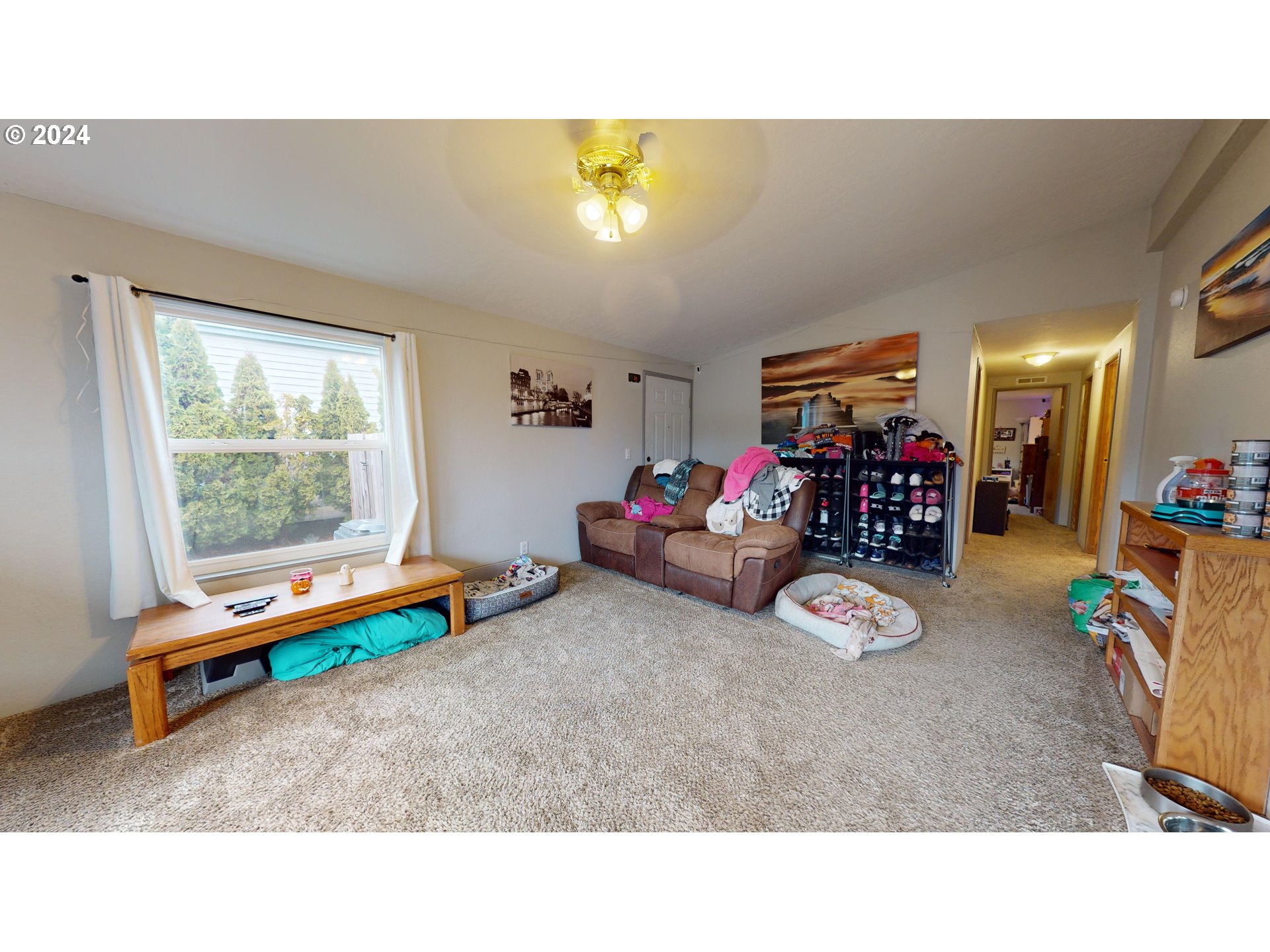 1251 South 58th Street Springfield, OR 97478 - Photo 15 of 24 a living room with furniture and a window