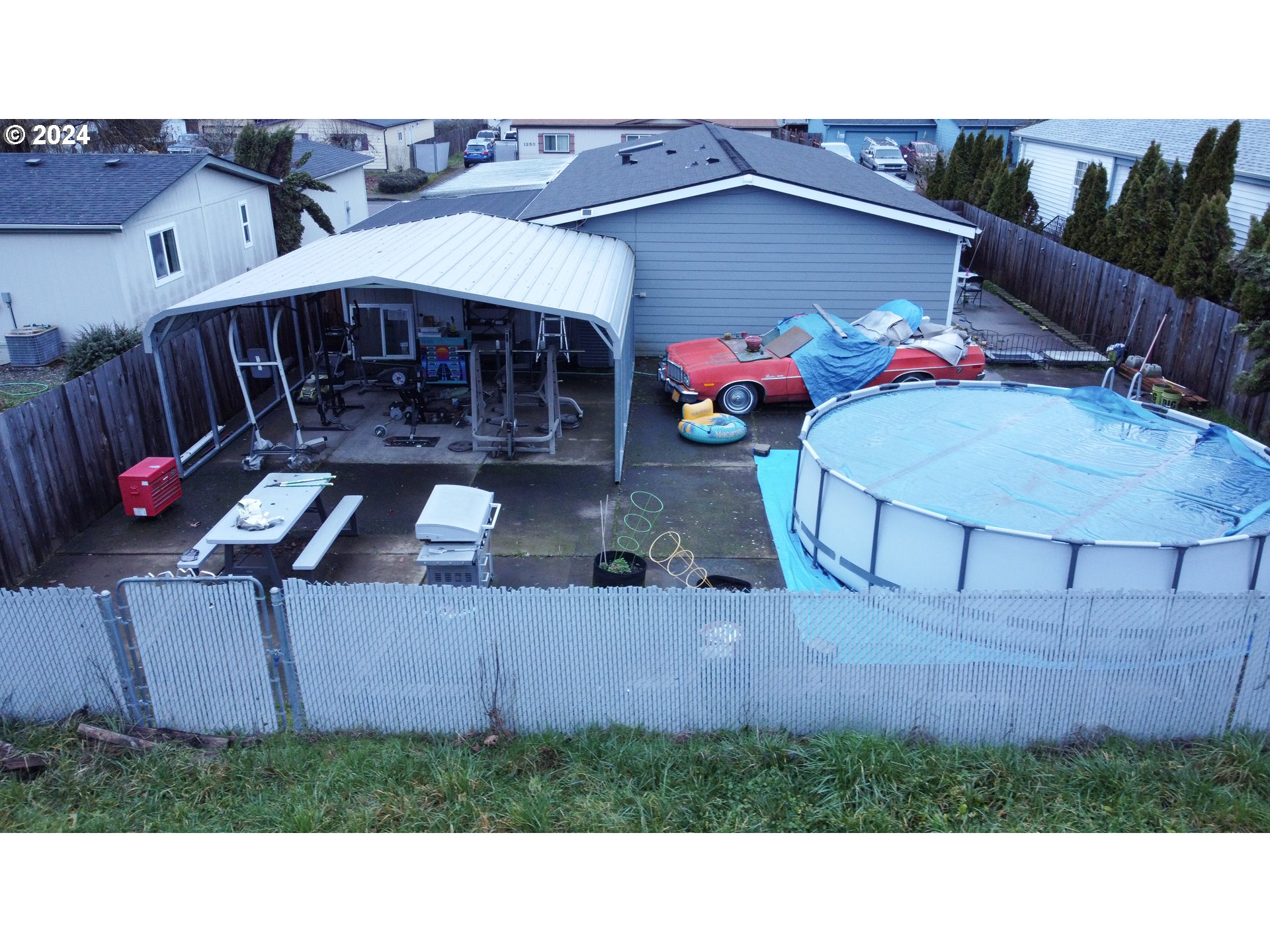 1251 South 58th Street Springfield, OR 97478 - Photo 3 of 24 a view of yard with patio