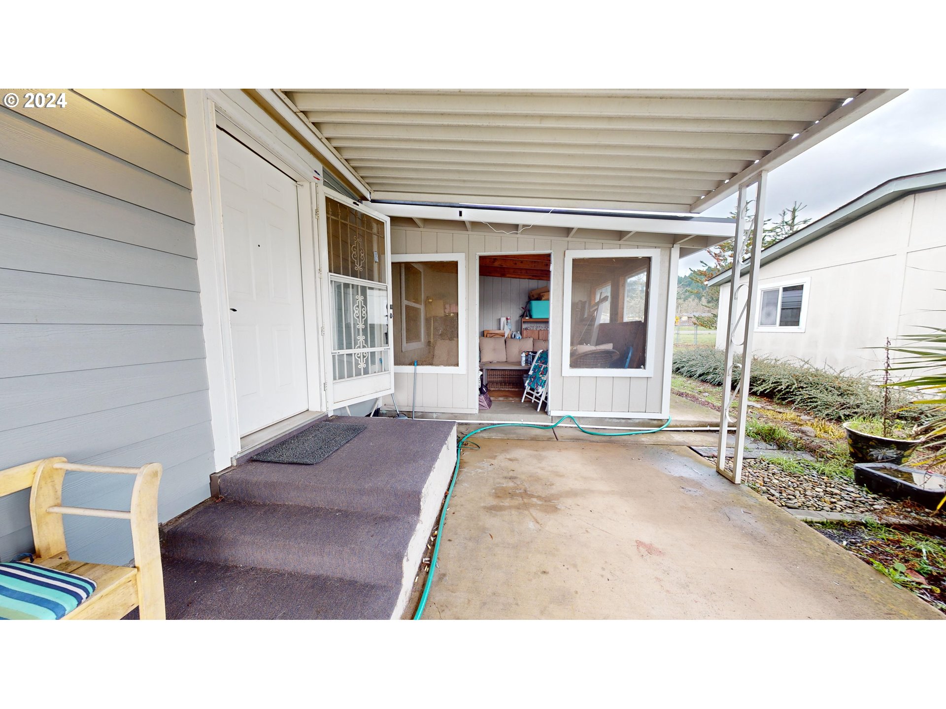 1251 South 58th Street Springfield, OR 97478 - Photo 6 of 24 a outdoor space view with a sitting space