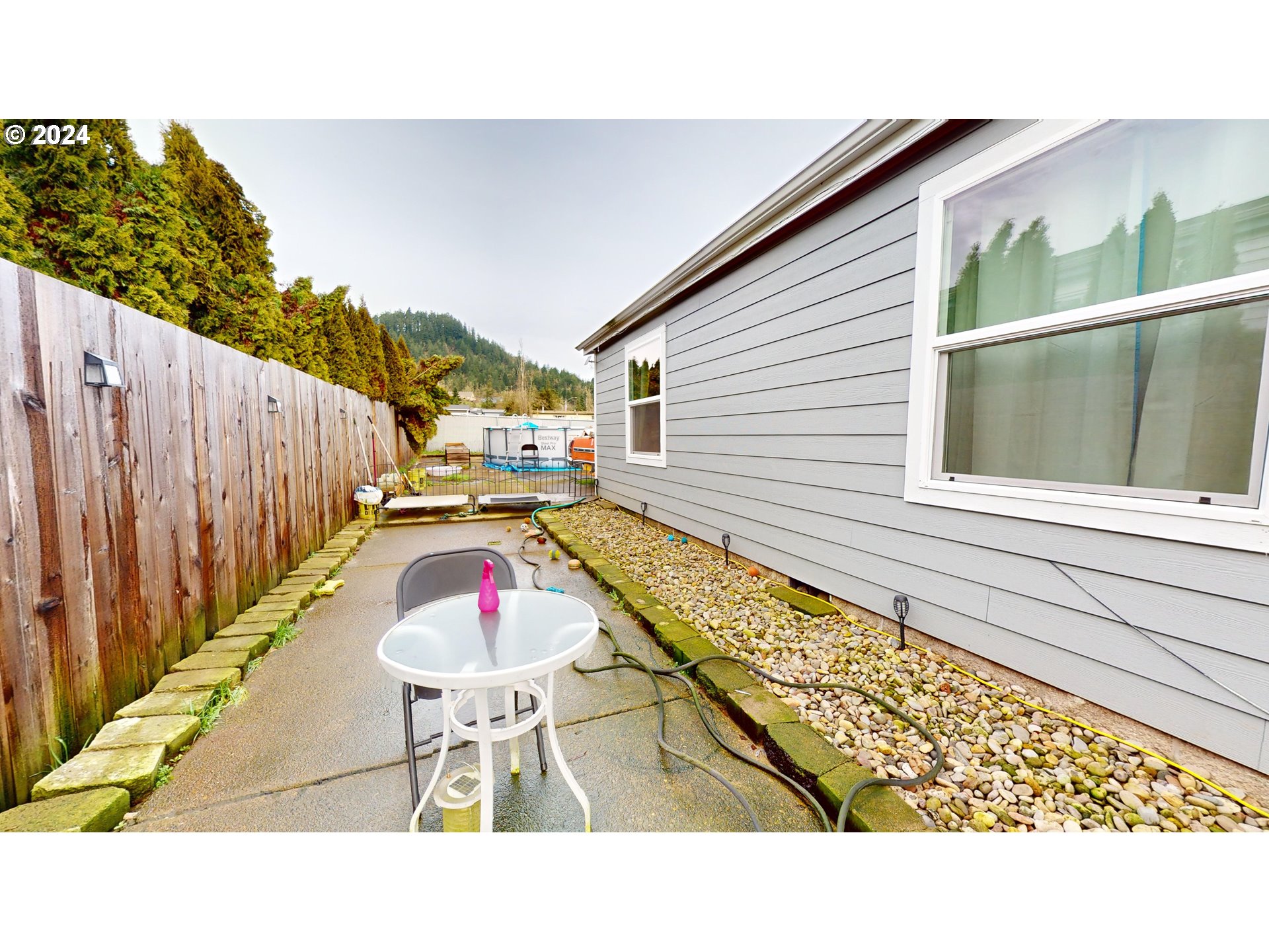 1251 South 58th Street Springfield, OR 97478 - Photo 7 of 24 a balcony with table and chairs