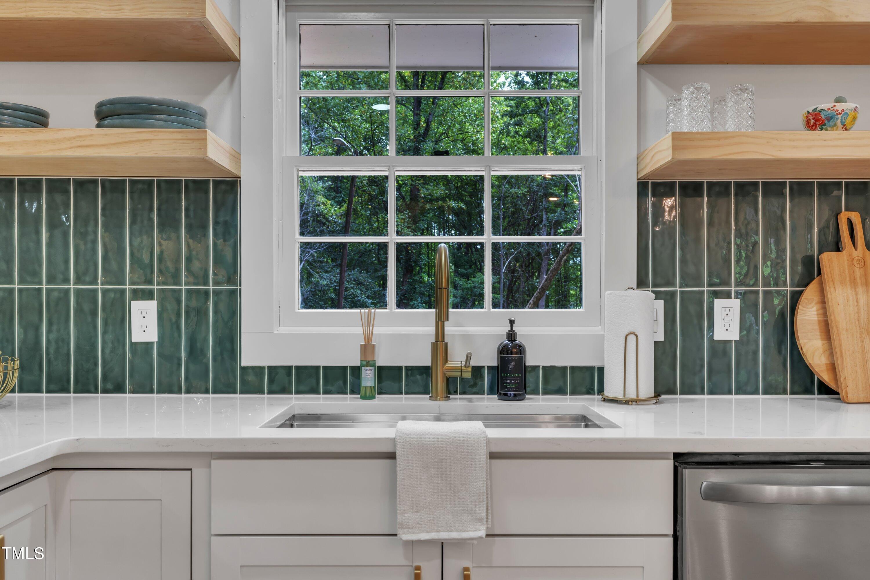 3023 Creech Road Garner, NC 27529 - Photo 19 of 42 a view of a sink and a window