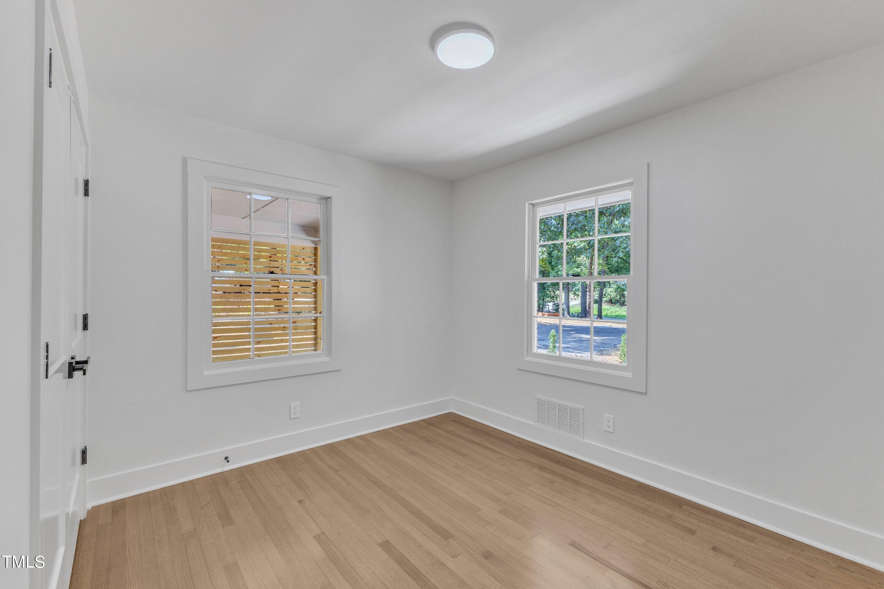 3023 Creech Road Garner, NC 27529 - Photo 29 of 42 an empty room with a window